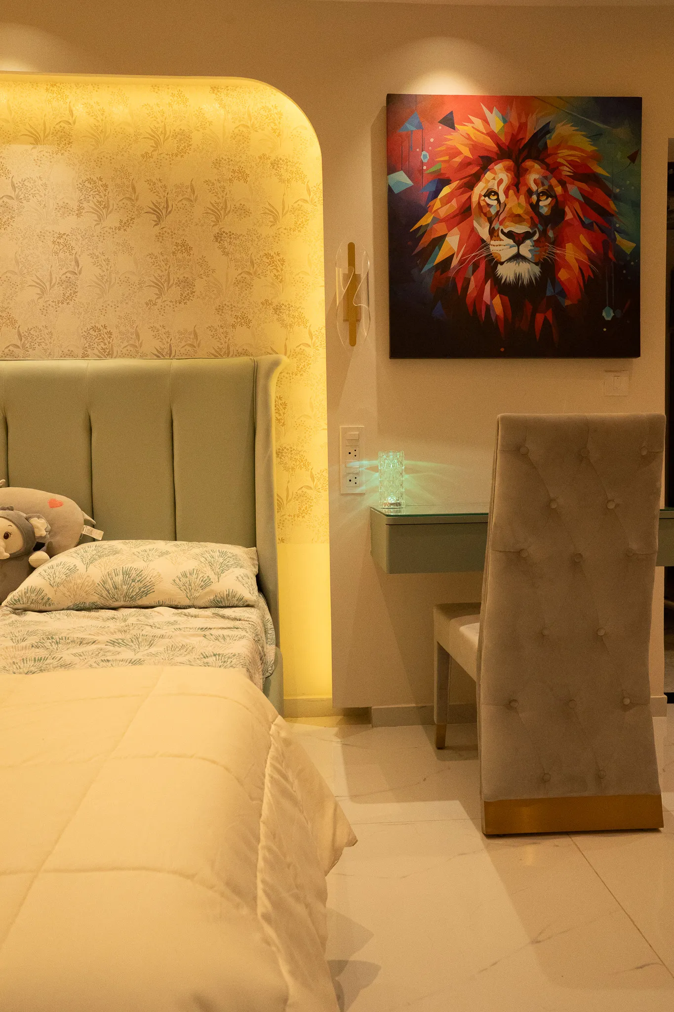Kids' bedroom with sage headboard, study desk and lion artwork — Divyarjuna